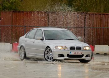 BMW 3-series E46, 2019 drift event on a wet epoxy track.