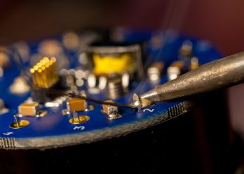 Close-up of soldering through-hole connectors.